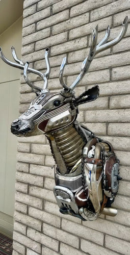 Buck De Lux – A handcrafted steampunk metal deer head wall sculpture by Paul Klaine, featuring industrial gears, mechanical elements, and a rustic hunting lodge aesthetic, perfect for steampunk and wildlife-inspired decor