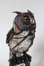 Load image into Gallery viewer, Handcrafted metal great horned owl sculpture by David Groenjes made from reclaimed steel, gears, and chains, perched on an industrial base with a piercing gaze.