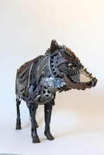 Load image into Gallery viewer, Handcrafted metal javelina sculpture by David Groenjes made from reclaimed steel, gears, and saw blades, standing against a white background.