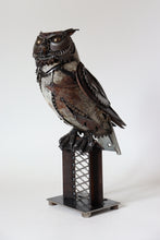 Load image into Gallery viewer, Handcrafted metal great horned owl sculpture by David Groenjes made from reclaimed steel, gears, and chains, perched on an industrial base with a piercing gaze.