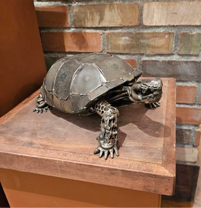 "Side view of Desert Tortoise 1 metal sculpture by David Groenjes – Showcasing intricate welding and a rustic, weathered patina on reclaimed metal."