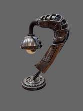 Load image into Gallery viewer, Stroke of Chrome – A handcrafted steampunk industrial metal lamp with exposed gears, polished chrome finish, and intricate piping for a vintage-inspired lighting aesthetic