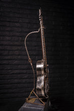 Load image into Gallery viewer, Spanish Ripper&quot; reclaimed metal guitar sculpture by Paul Klaine, 56-inch tall steel artwork featuring chains, barbed wire, gears, and saw blade design, industrial contemporary art piece.