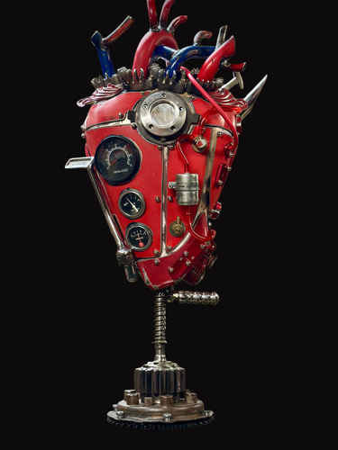 “Kick Start My Heart steampunk metal sculpture by Paul Klaine, reclaimed steel anatomical heart with gauges, gears, and industrial detailing.”