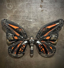 Load image into Gallery viewer, &quot;Mechanical Monarch&quot; reclaimed metal butterfly sculpture by David Groenjes, 31-inch tall wall-mounted artwork with orange and black steel wings crafted from salvaged parts.