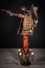Load image into Gallery viewer, &quot;Shot for Shot&quot; reclaimed metal sculpture by Paul Klaine, 56-inch tall skeletal gunslinger with sombrero, tequila bottle, revolver, and industrial steel base with bell and candles.