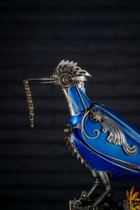 “Roadrunner reclaimed metal sculpture by Paul Klaine, 32-inch steampunk-inspired steel artwork of desert bird handcrafted from salvaged industrial materials.”