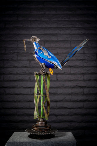 “Roadrunner reclaimed metal sculpture by Paul Klaine, 32-inch steampunk-inspired steel artwork of desert bird handcrafted from salvaged industrial materials.”