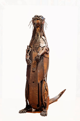 “Standup Guy” metal otter sculpture by David Groenjes, handcrafted from reclaimed steel and upcycled industrial materials, original wildlife art at Ian Russell Gallery Prescott Arizona.