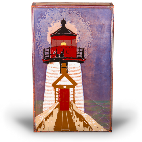 Houston Llew Spiritile #239 ‘Beacon’ – Glass-on-copper art tile featuring a lighthouse standing tall against a sunset sky, perfect for nautical decor and coastal home accents