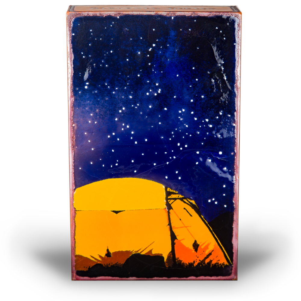 Houston Llew Spiritile #264 ‘Our Corner’ – Glass-on-copper art tile featuring two Adirondack chairs overlooking a sunset by the water, perfect for lake house or coastal decor.