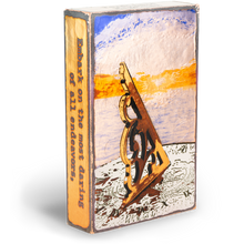 Load image into Gallery viewer, Side view of Houston Llew Spiritile #255 ‘Tardis’ – A vibrant glass enamel tile with an iconic blue police box design and an inspiring quote about time and adventure.
