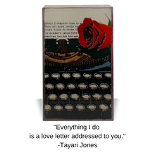 Load image into Gallery viewer, Houston Llew Spiritile #255 ‘Wholehearted’ displayed in a cozy home setting – A unique glass-on-copper wall art piece featuring intertwined hearts, ideal for anniversary gifts and romantic decor.